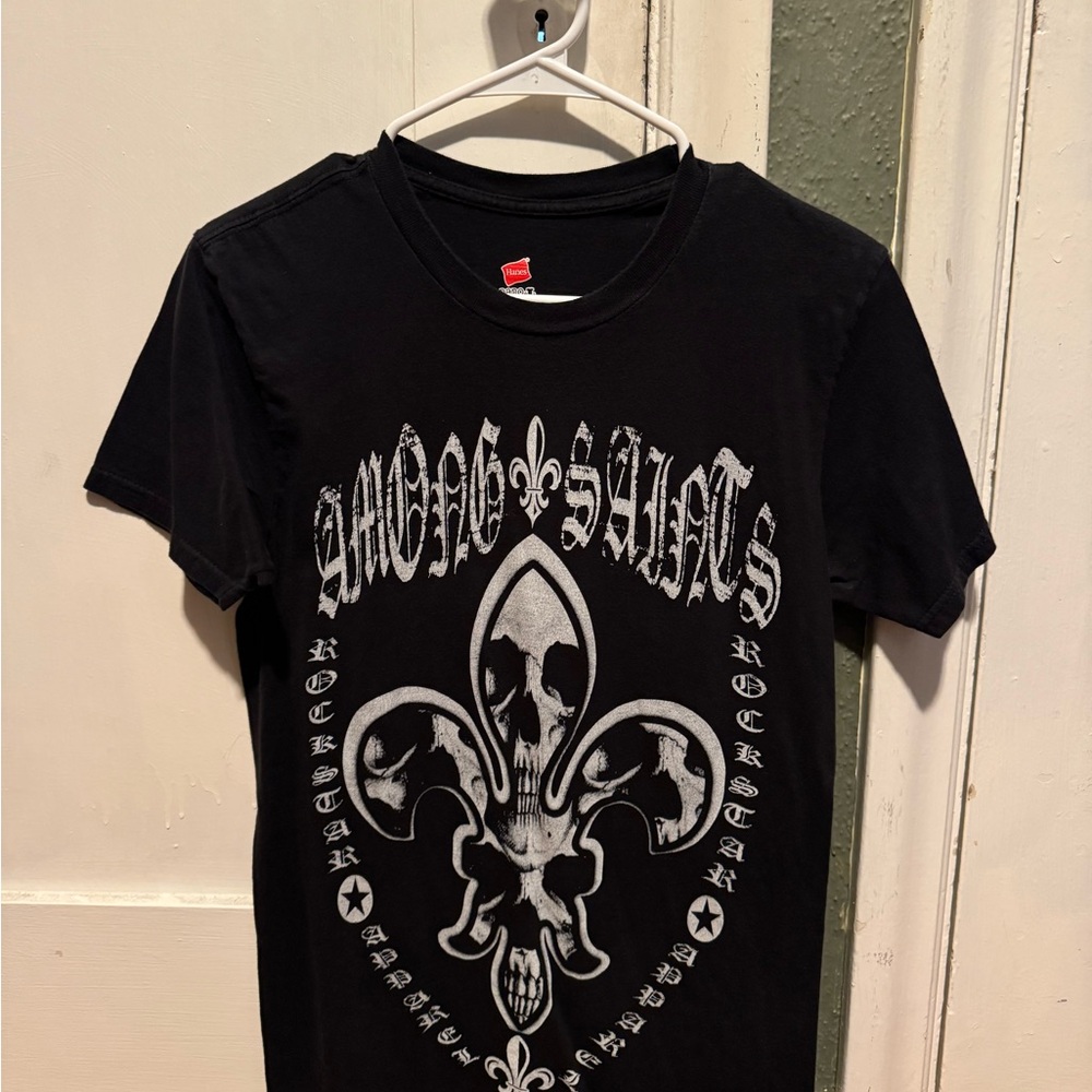 Among Saints Black Graphic T-Shirt with Skull and Fleur-de-lis Design